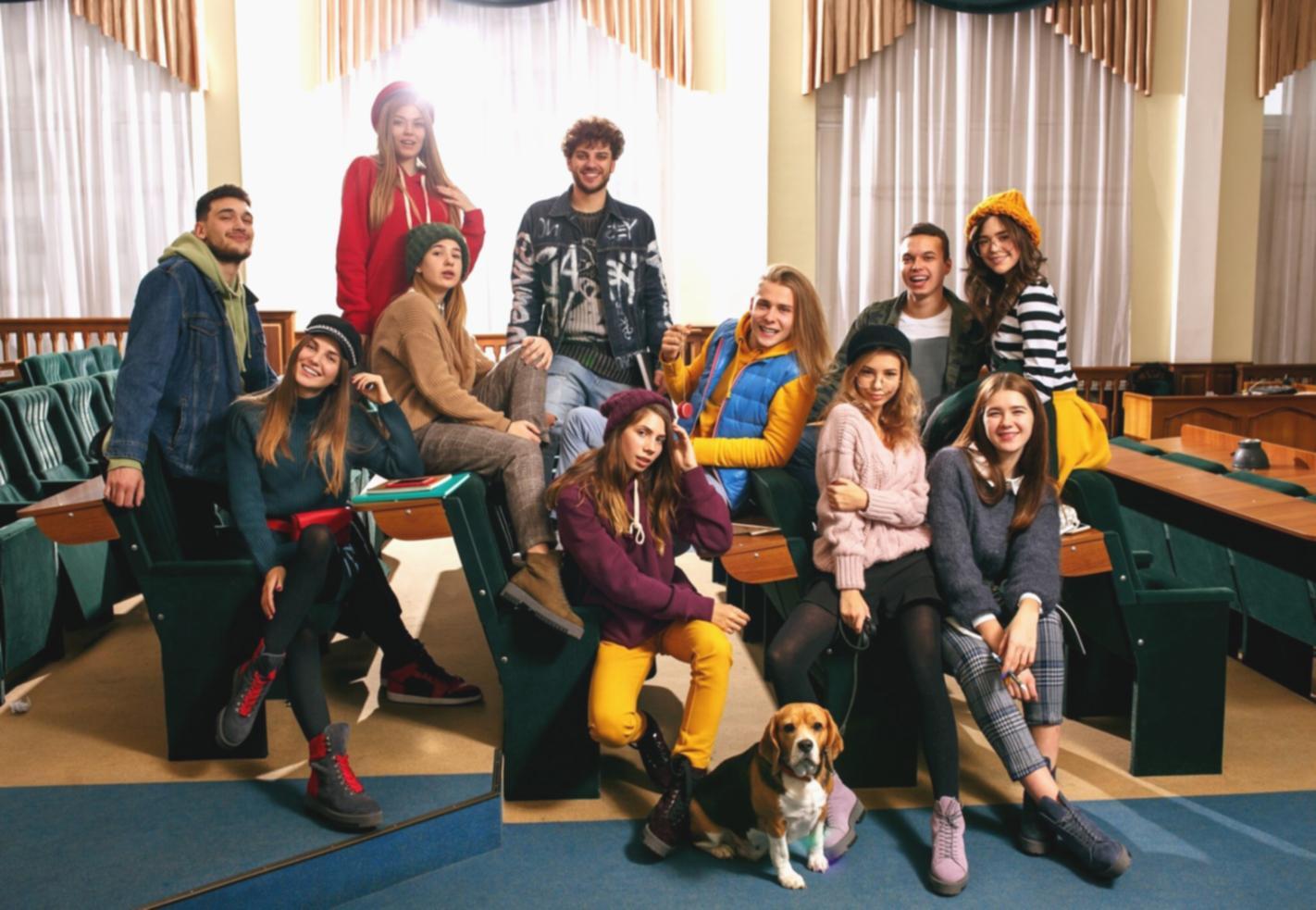 Person using calculator and reviewing budget plans