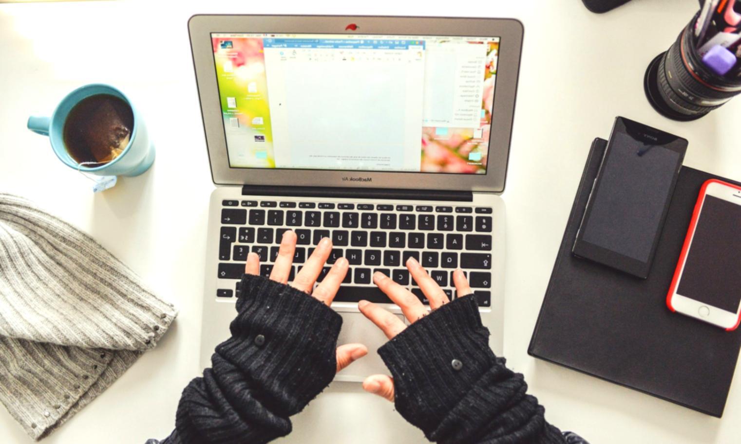 Professional financial planning session showing budget documents and calculator on a modern desk